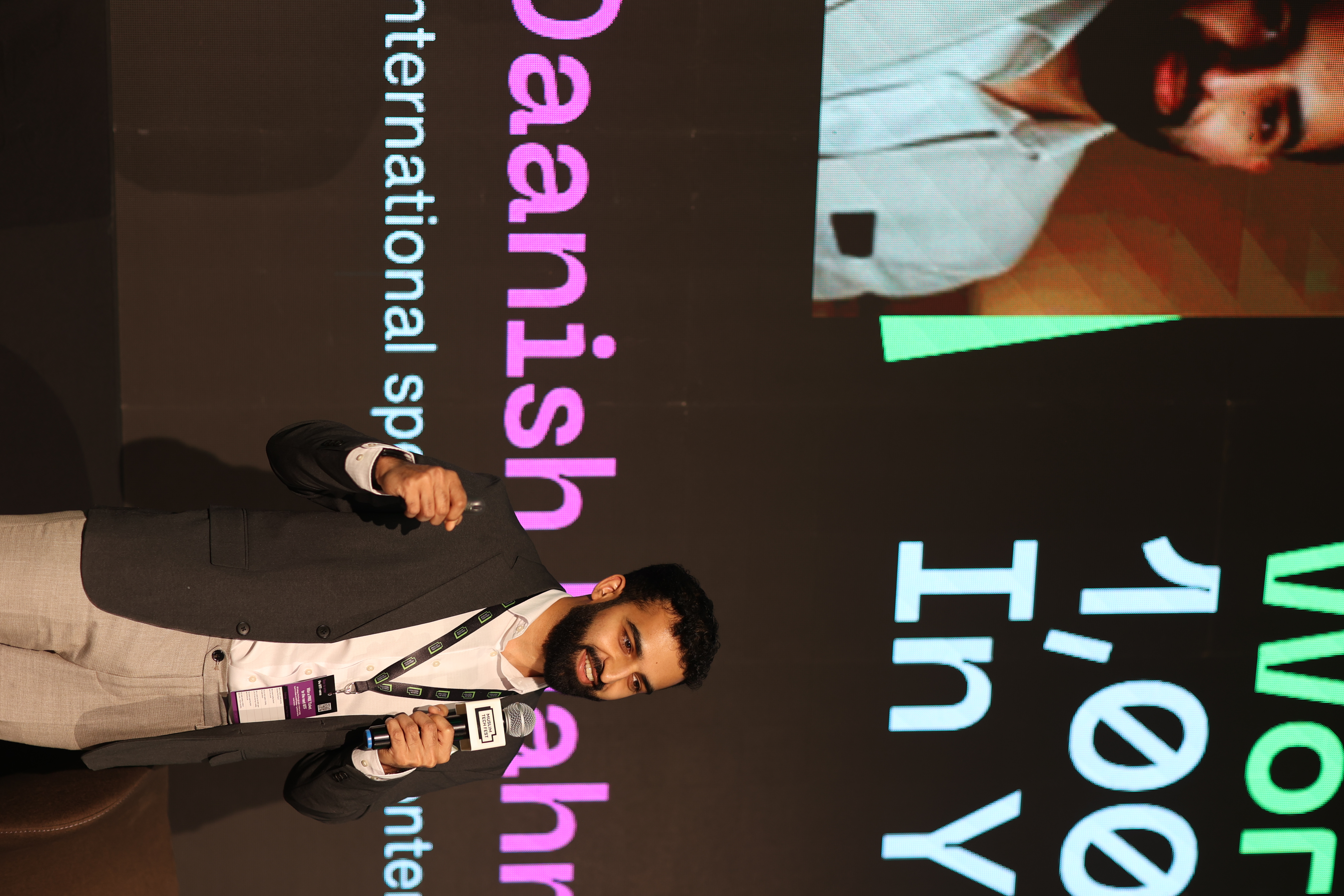 Dr Daanish speaking on stage at Muslim Tech Fest Bosnia